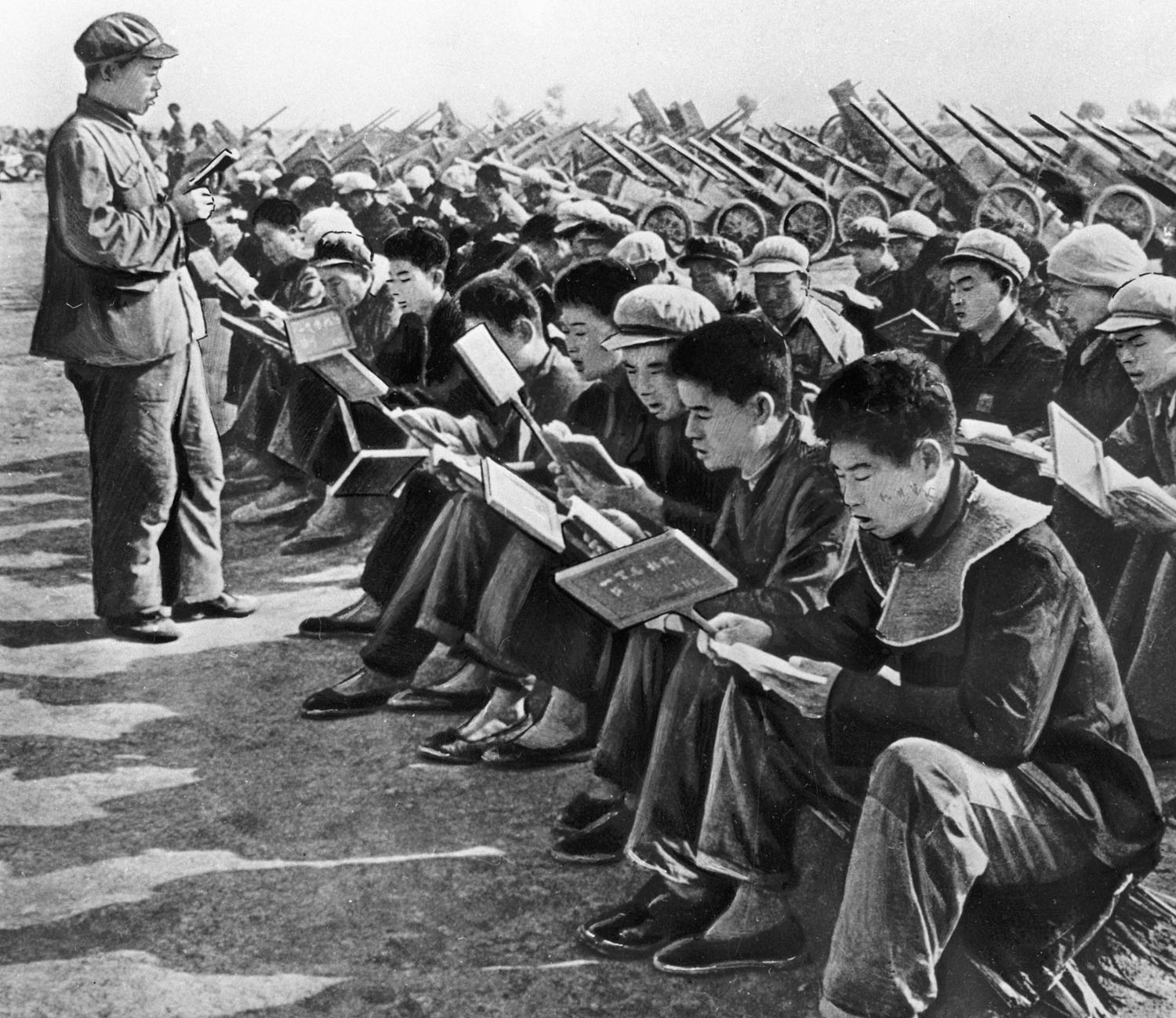 Chinese People Reading A Book Of Quotations By Their Leader Mao Zedong Quillette